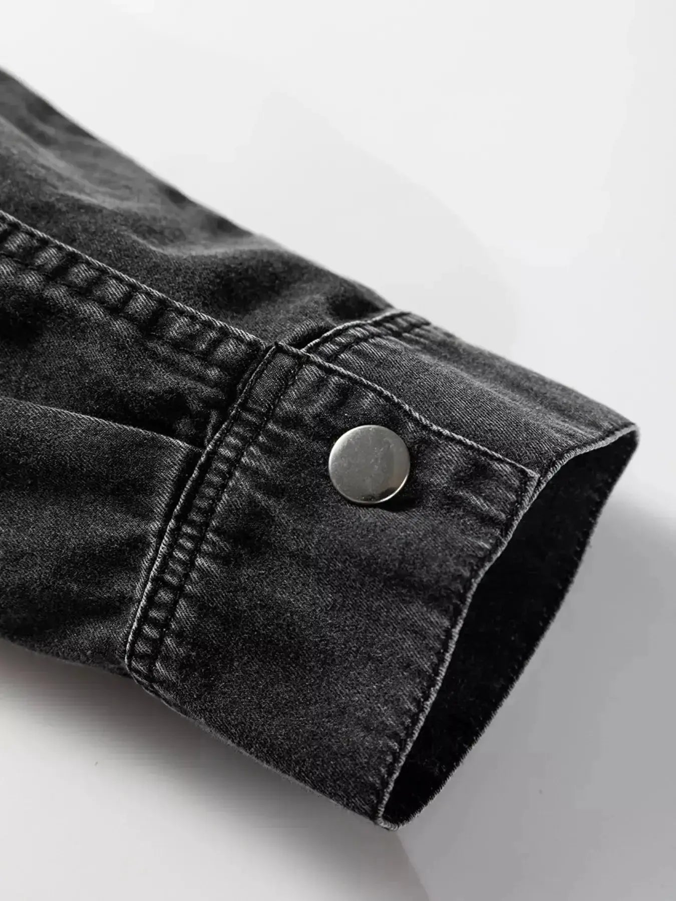 Women's raw hem denim shirt dress by Trendsi, long sleeve button-down cotton dress with casual, stylish denim fabric.