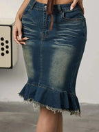Women's raw hem mermaid denim midi skirt by Trendsi, featuring a stretchy blue jean silhouette with a stylish raw hem detail.