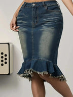 Women's raw hem mermaid denim midi skirt by Trendsi, featuring stretchy blue jean fabric and a fitted silhouette.