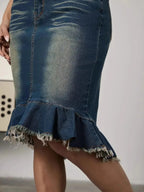 Women’s raw hem mermaid denim midi skirt by Trendsi, showcasing a stretchy blue jean silhouette with a fitted, flared design.