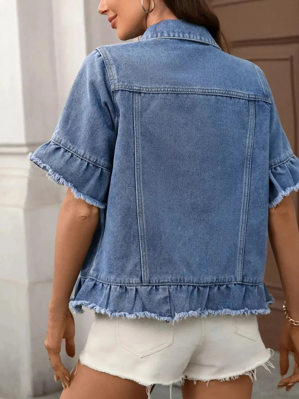 Women’s raw hem ruffled denim jacket by Trendsi featuring button-up front and stylish design, perfect for casual outfits.