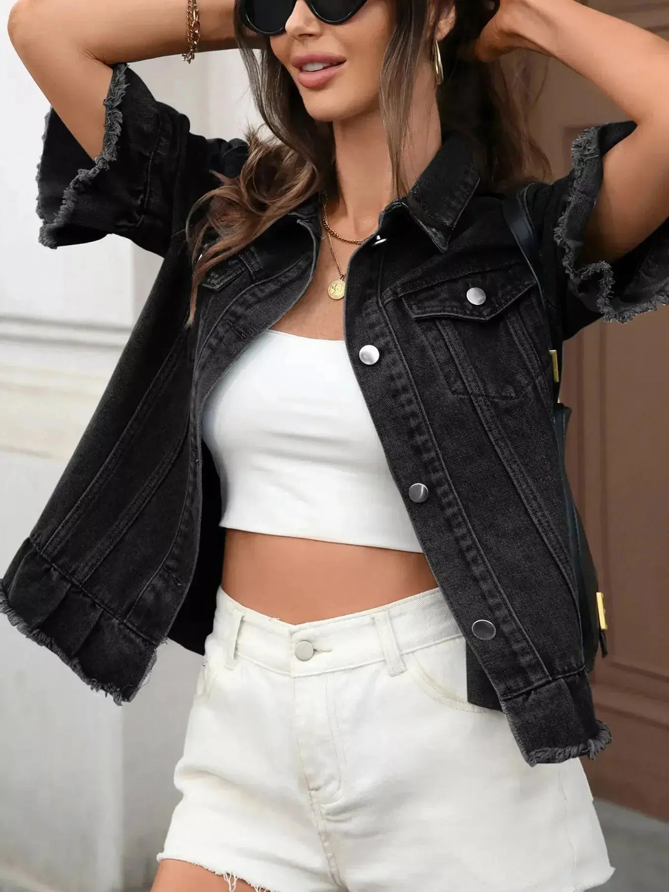 Women's raw hem ruffled denim jacket by Trendsi, stylish button-up jean jacket with ruffle details and distressed hem.