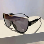 Women’s retro one-piece shield sunglasses by Plush Fashion Hub featuring oversized, lightweight eyewear for stylish sun protection.