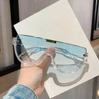 Women’s retro oversized shield sunglasses by Plush Fashion Hub, lightweight one-piece design with stylish, bold frames.