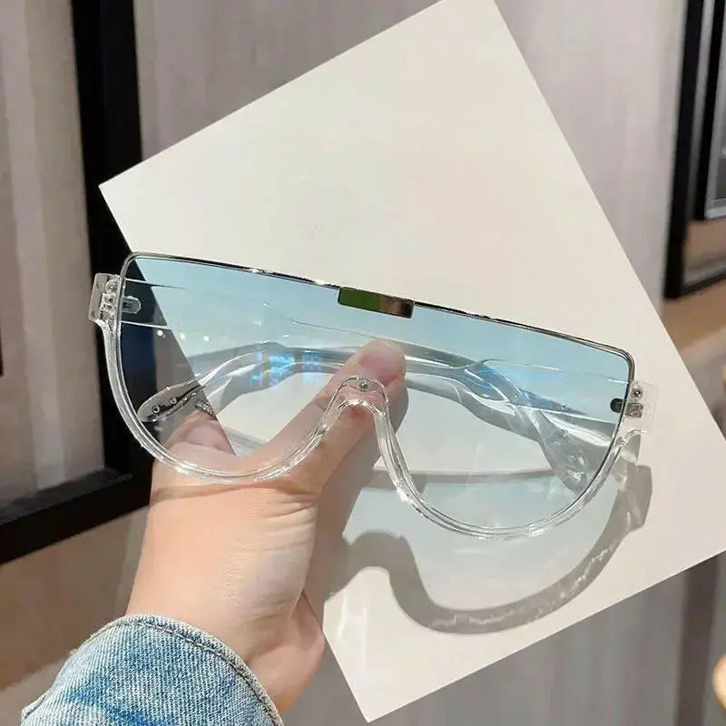 Women’s retro oversized shield sunglasses by Plush Fashion Hub, lightweight one-piece design with stylish, bold frames.