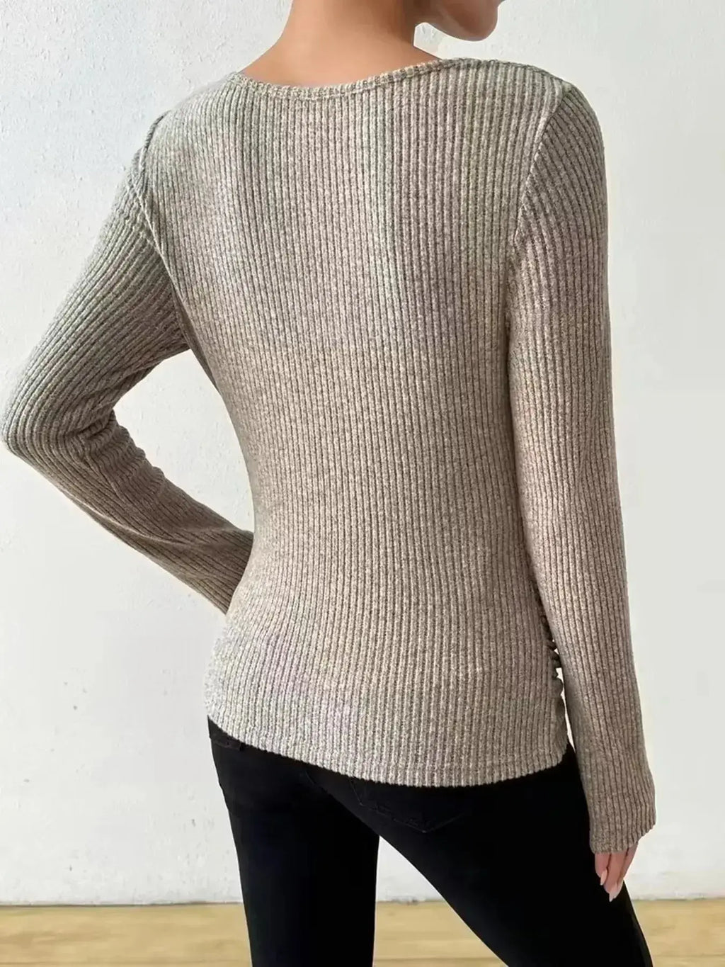 Women’s ribbed cowl neck long sleeve sweater with ruched detail from Trendsi, showcasing its cozy ribbed fabric and stylish design.