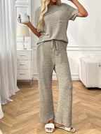 Women's ribbed knit short sleeve loungewear set with pockets, stylish and comfortable pajamas from Trendsi.