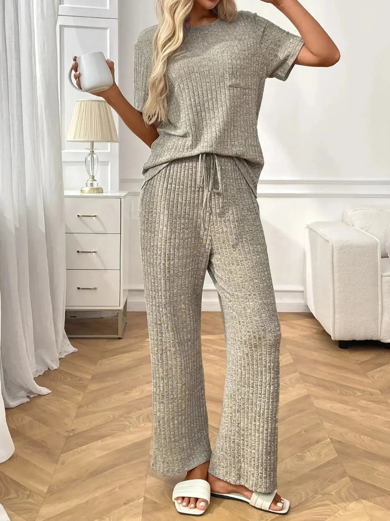 Women's ribbed knit short sleeve loungewear set with pockets, stylish and comfortable pajamas from Trendsi.