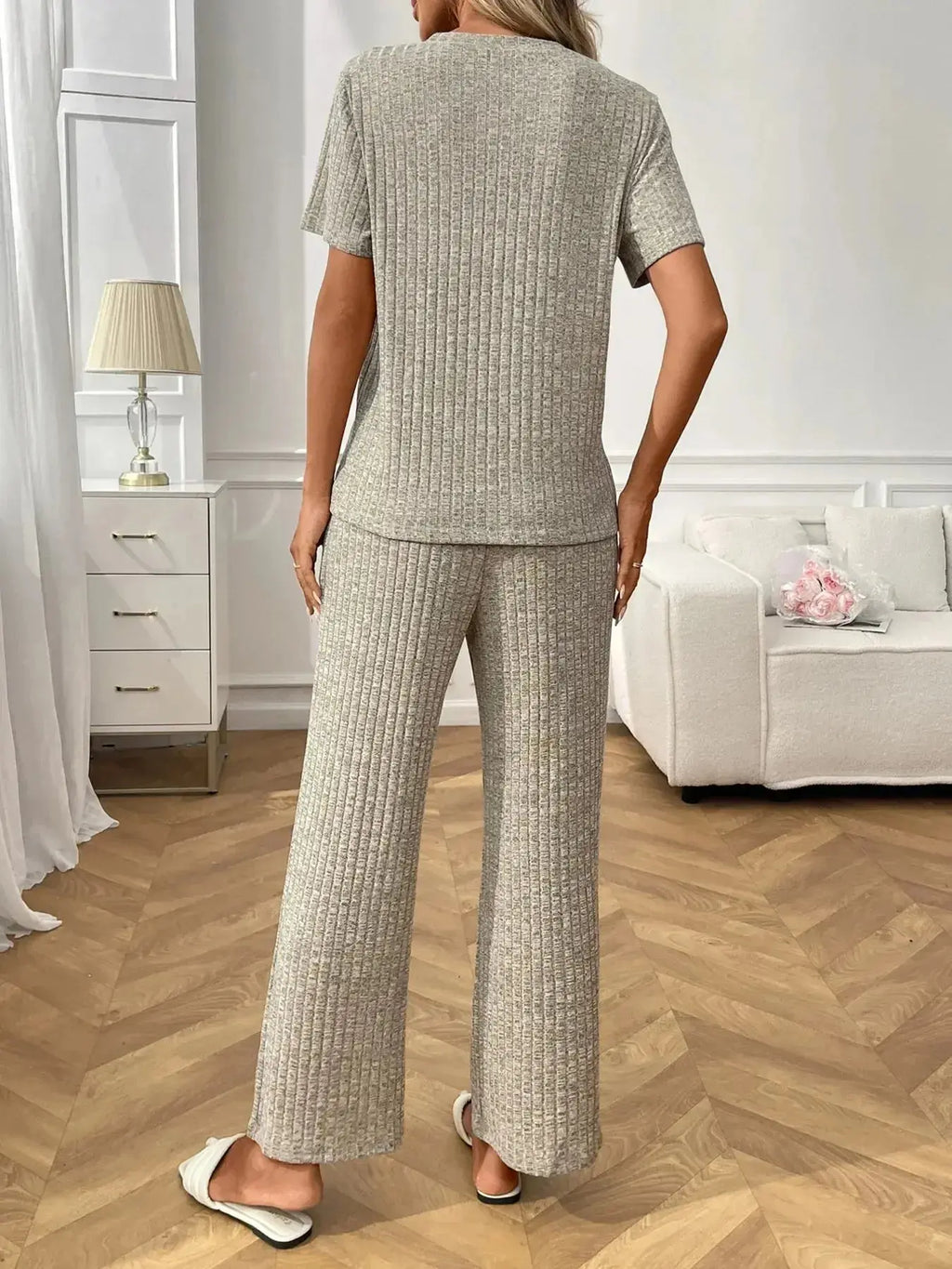 Women’s ribbed knit short sleeve loungewear pajamas set with pockets, stylish and comfortable for relaxing at home.