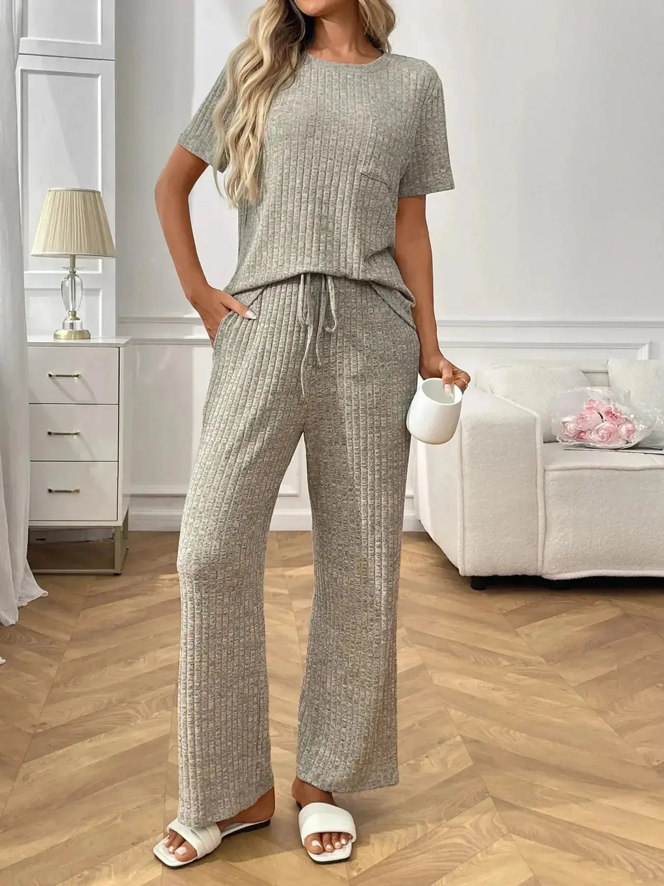 Women's ribbed knit short sleeve loungewear set with pockets, comfortable pajamas by Trendsi, ideal for relaxed home wear.