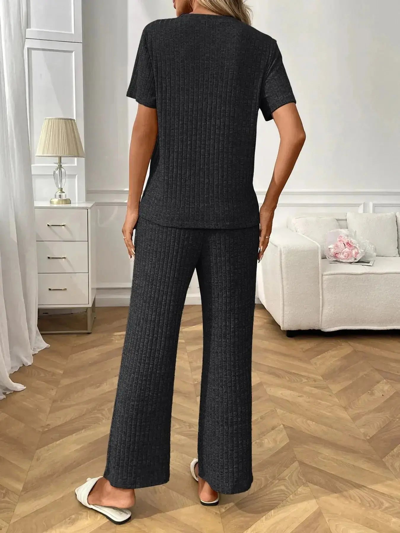 Women's ribbed knit short sleeve loungewear set with pockets, comfortable pajamas from Trendsi, perfect for relaxed home wear.