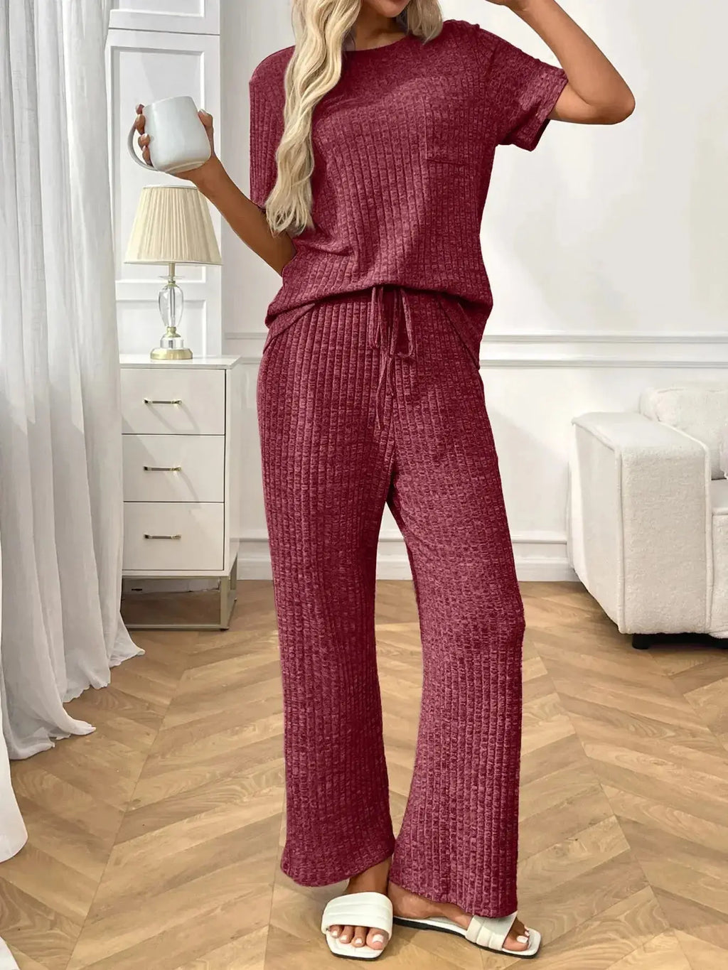 Women's ribbed knit short sleeve loungewear set with pockets, comfortable pajamas by Trendsi, ideal for relaxing at home.