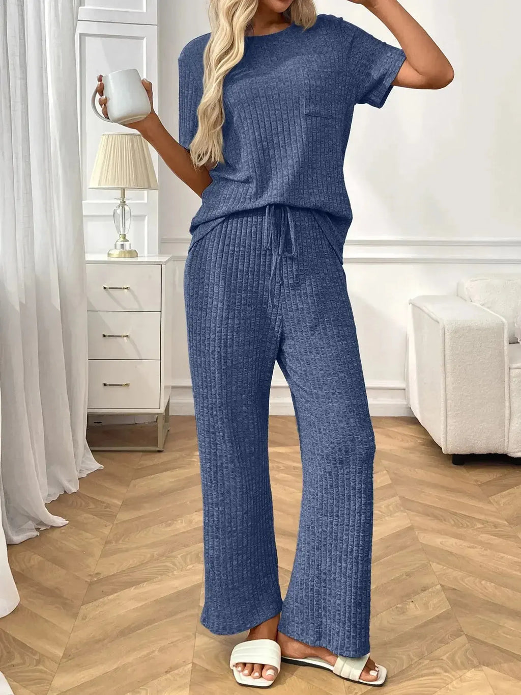 Women's ribbed knit short sleeve loungewear pajama set with pockets, stylish and comfortable by Trendsi.