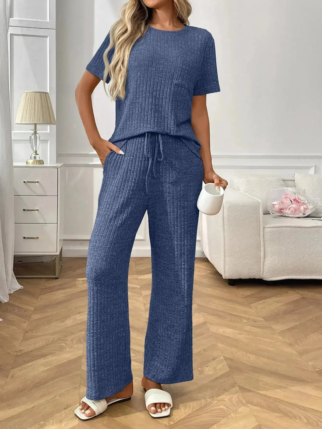 Women’s ribbed knit short sleeve loungewear set with pockets, cozy pajamas by Trendsi, featuring a relaxed fit and comfortable fabric.