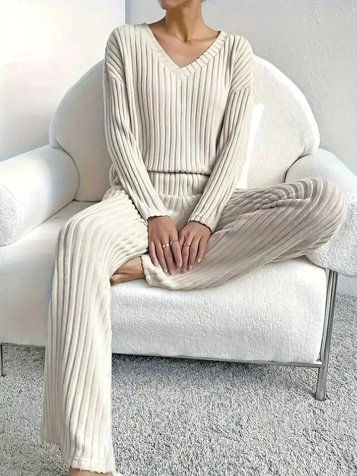 Women’s ribbed knit V-neck lounge set by Plush Fashion Hub, two-piece comfortable matching pant set for relaxing at home.