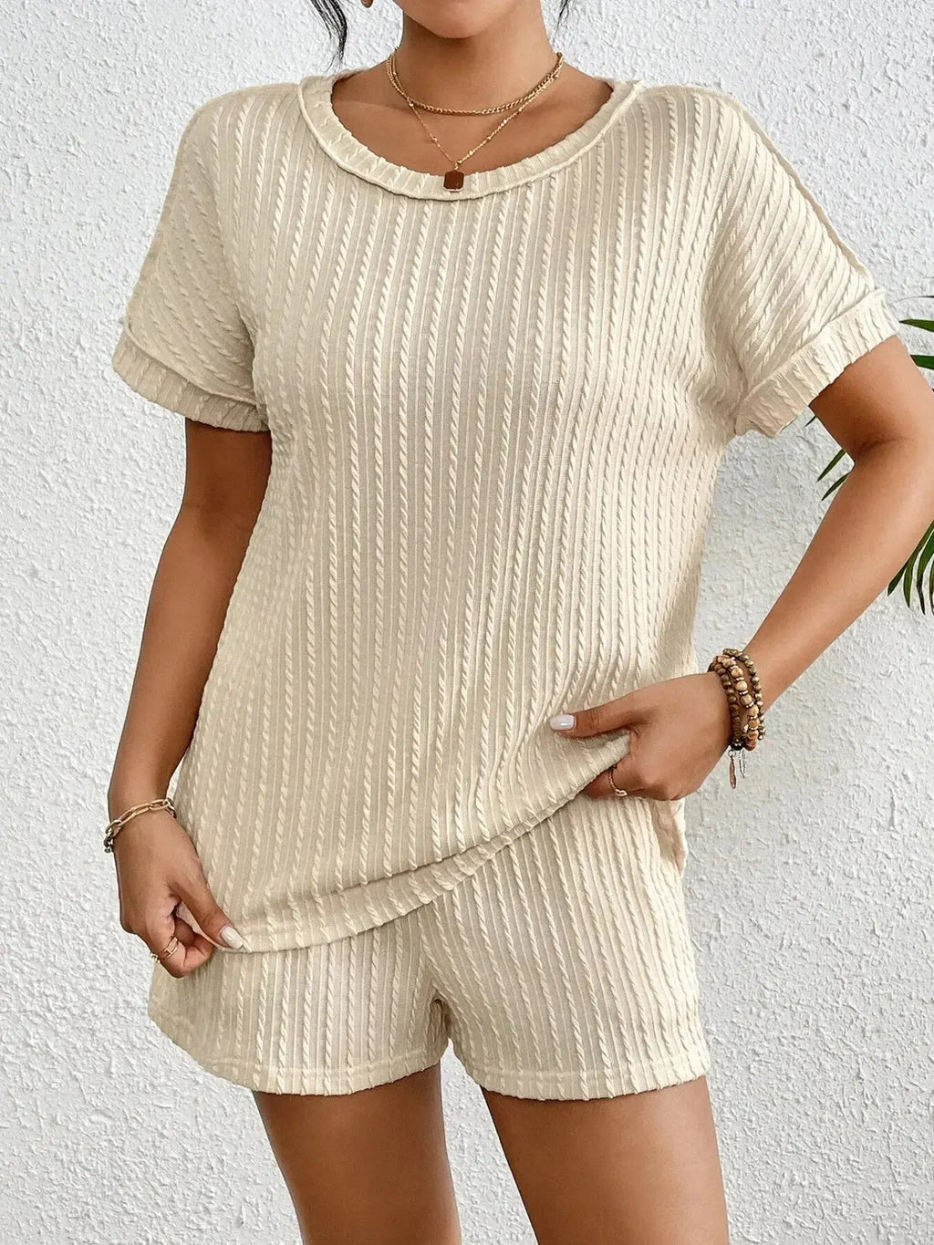 Women's ribbed lounge set with round neck top and shorts, soft two-piece pajama set by Trendsi.
