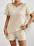 Women's ribbed lounge set with round neck top and shorts, soft two-piece pajama set by Trendsi.