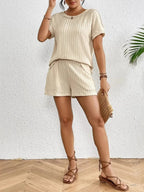 Women’s ribbed lounge set from Trendsi featuring a round neck top and matching shorts, soft and comfortable pajama two-piece.