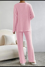 Women's ribbed V-neck lounge set, comfortable two-piece pajama set by Trendsi, featuring soft fabric and relaxed fit.