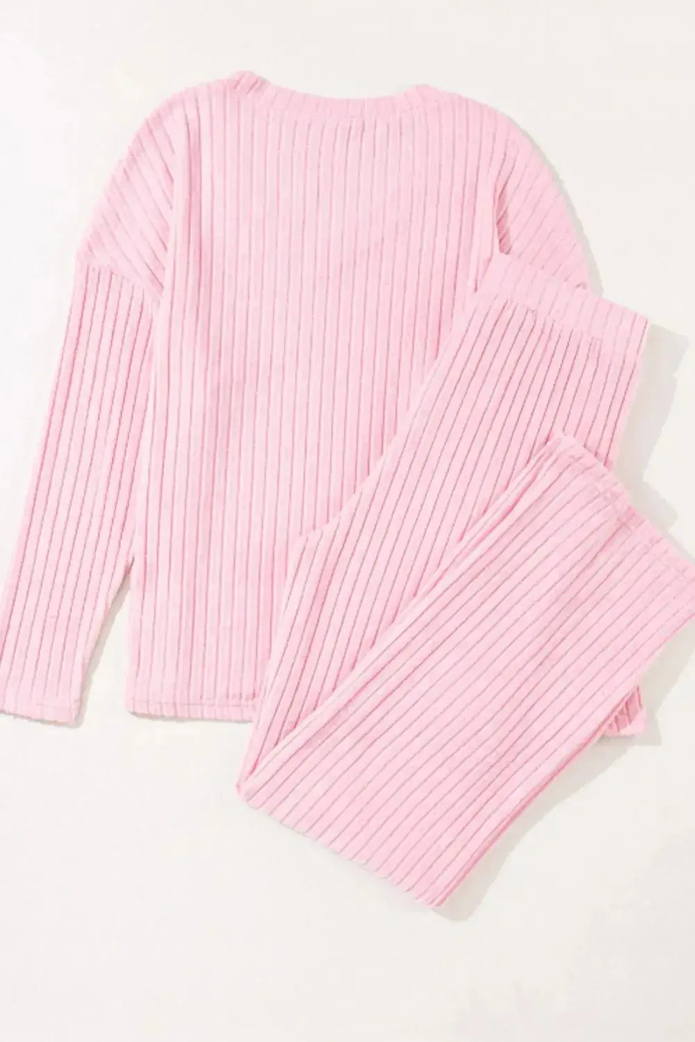 Women’s ribbed V-neck lounge set by Trendsi, comfortable two-piece pajama set with soft fabric and relaxed fit.