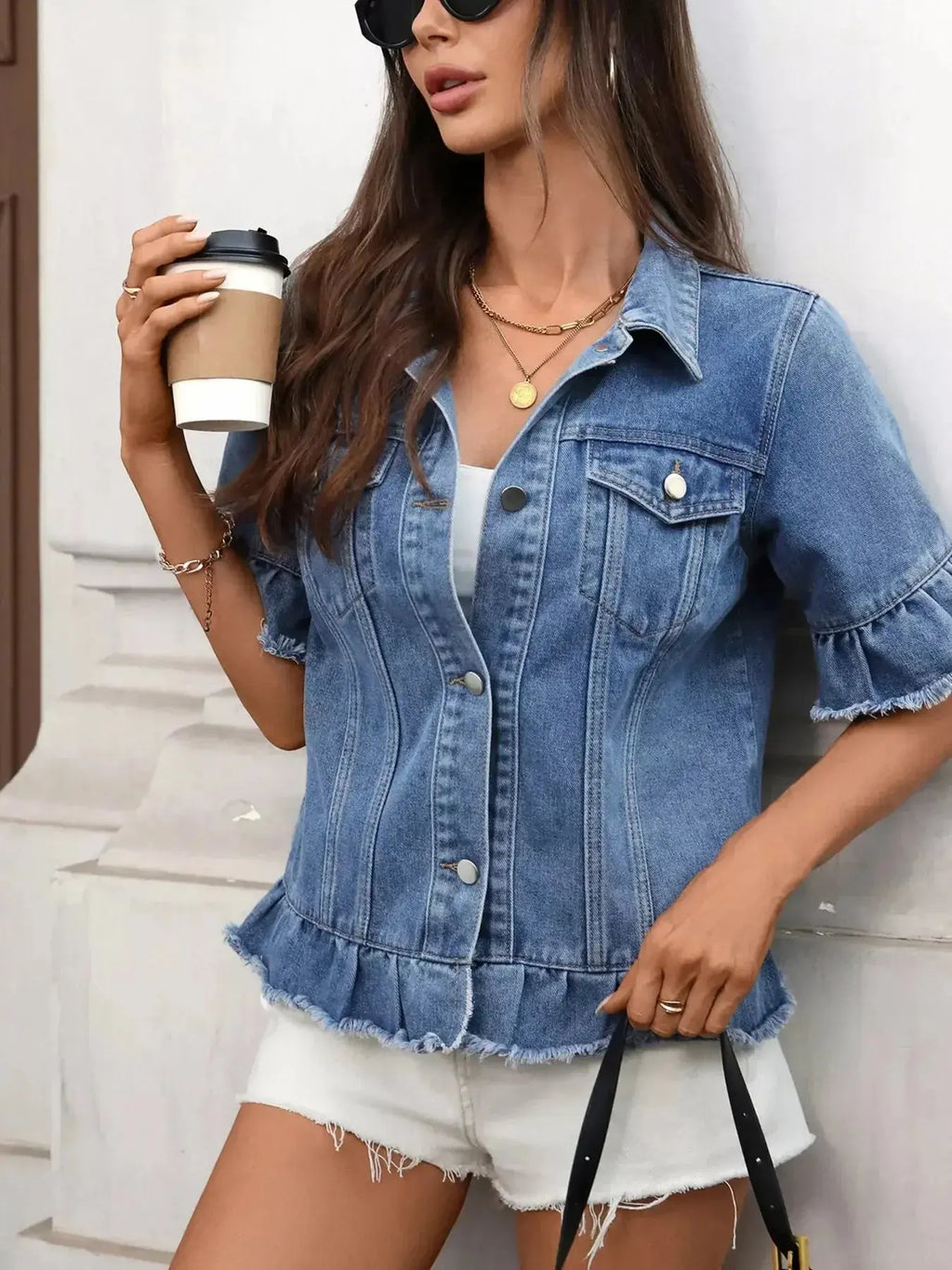 Women’s ruffled raw hem button-up denim jacket by Trendsi, featuring distressed denim, ruffle details, and classic collar.