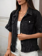 Women’s ruffled raw hem button-up denim jacket by Trendsi, featuring a stylish denim design with ruffle details and raw hem.