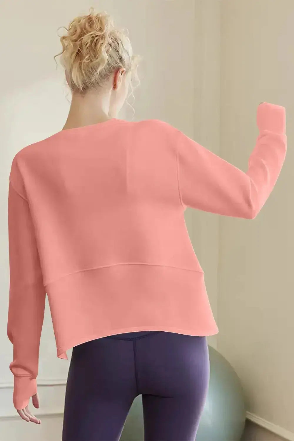 Women’s scuba long sleeve round neck sweatshirt by Trendsi, a minimalist everyday essential shirt with a comfortable fit.