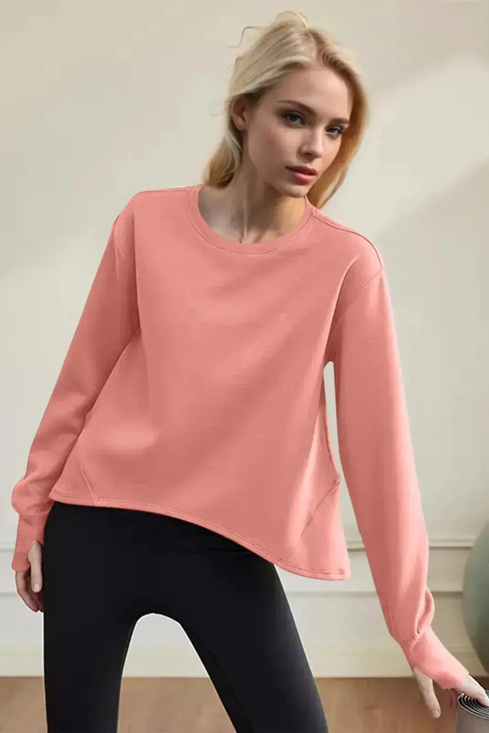 Women's scuba long sleeve round neck sweatshirt by Trendsi, featuring a minimalist design and comfortable everyday style.