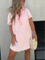 Women's short sleeve raw hem denim button-down dress by Plush Fashion Hub, featuring a casual, stylish denim design.