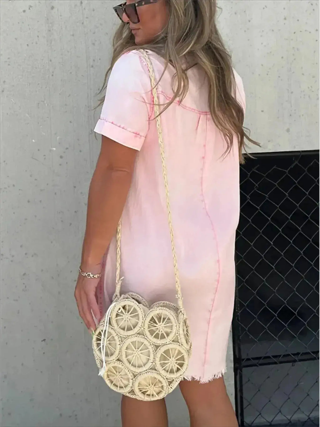 Women wearing a plush fashion hub short sleeve raw hem denim button-down dress, showcasing casual style and raw hem detail.