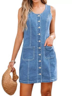 Women’s sleeveless denim dress by Trendsi featuring a button-front design and front pockets, casual summer style.