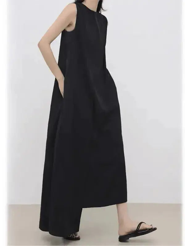 Women’s sleeveless irregular hem long dress by Plush Fashion Hub in solid color, flowing maxi dress with a stylish uneven hem.