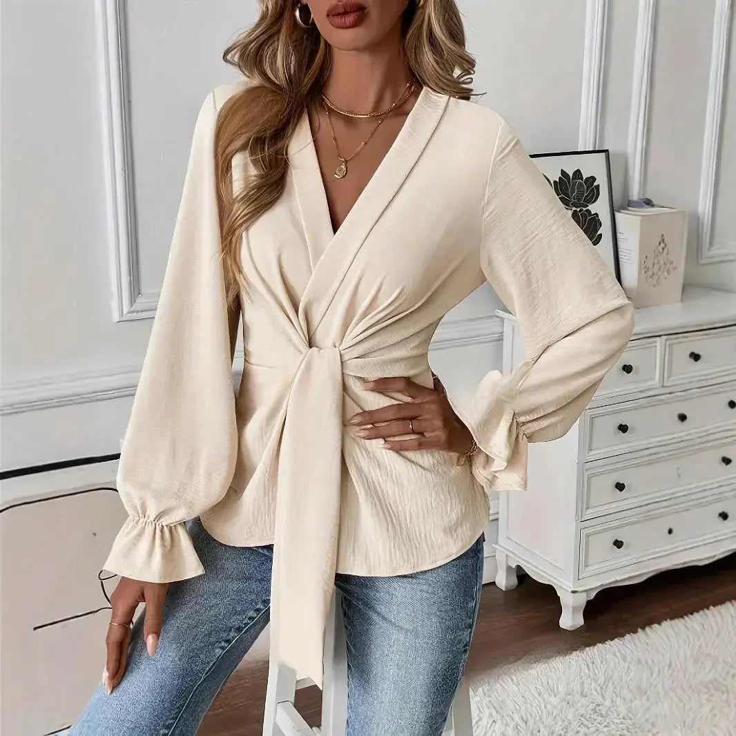 Elegant women's V-neck long sleeve blouse in solid color by Plush Fashion Hub, featuring a stylish, versatile design.
