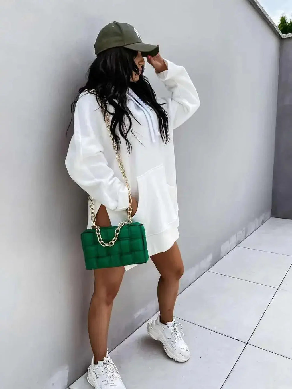 Women’s solid color mid-length hoodie by Plush Fashion Hub, cozy casual pullover sweatshirt with hood and long sleeves.