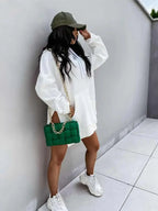 Women’s solid color mid-length hoodie by Plush Fashion Hub, cozy casual pullover sweatshirt with hood and long sleeves.