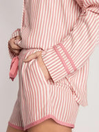 Women’s striped collared long sleeve top and shorts lounge set, trendy pajamas by Trendsi, comfortable and stylish sleepwear ensemble.