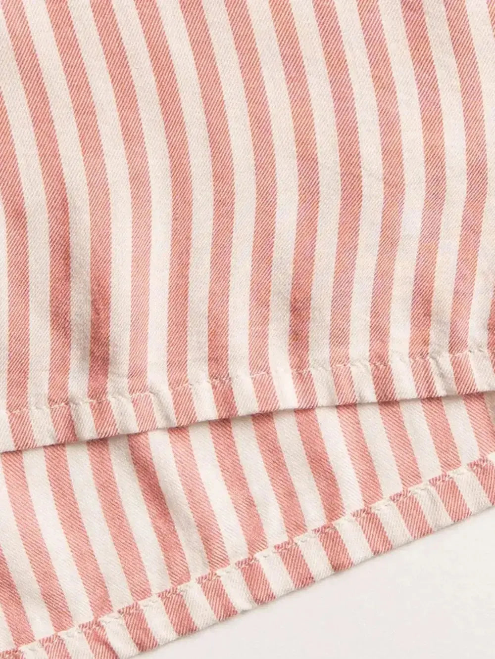 Women's striped collared long sleeve top and shorts lounge set by Trendsi, featuring comfortable pajama style with a casual, relaxed fit.