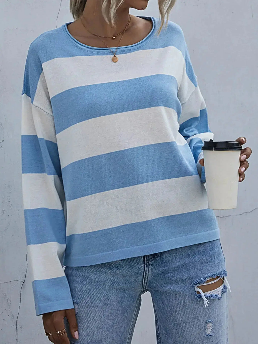 Women's striped long sleeve knit casual crewneck top by Trendsi, featuring a comfortable fit and classic design.