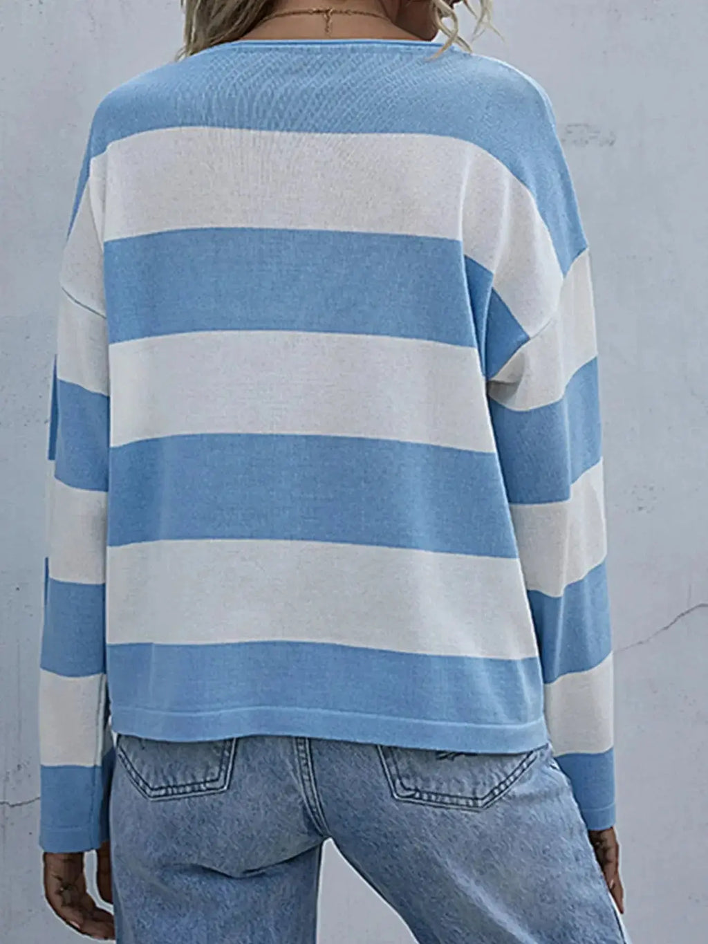 Women’s striped long sleeve knit casual crewneck top from Trendsi, featuring a comfortable fit and classic design.