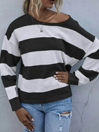 Women's striped knit long sleeve casual crewneck shirt from Trendsi, featuring a comfortable and stylish design.