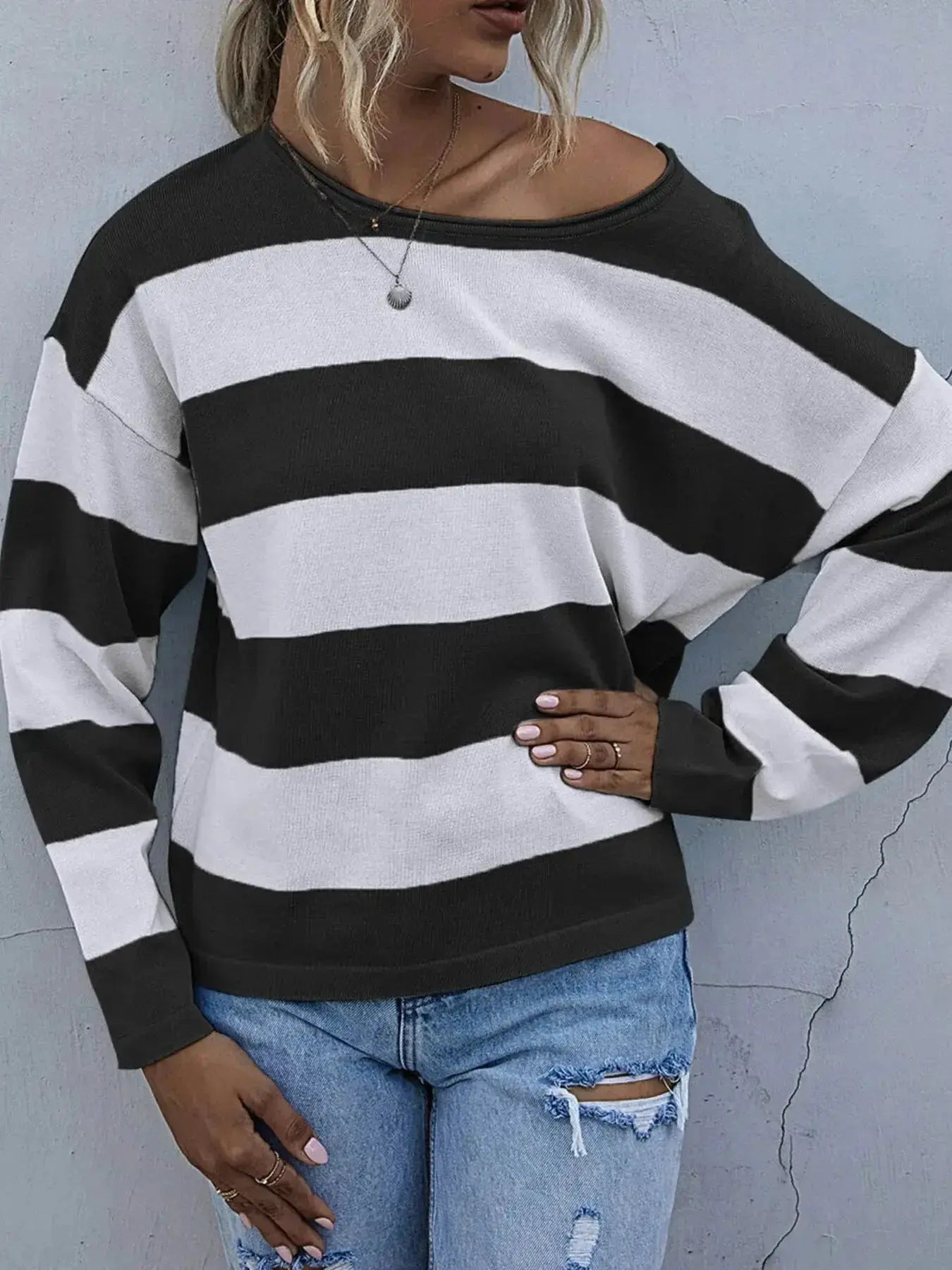 Women's striped knit long sleeve casual crewneck shirt from Trendsi, featuring a comfortable and stylish design.