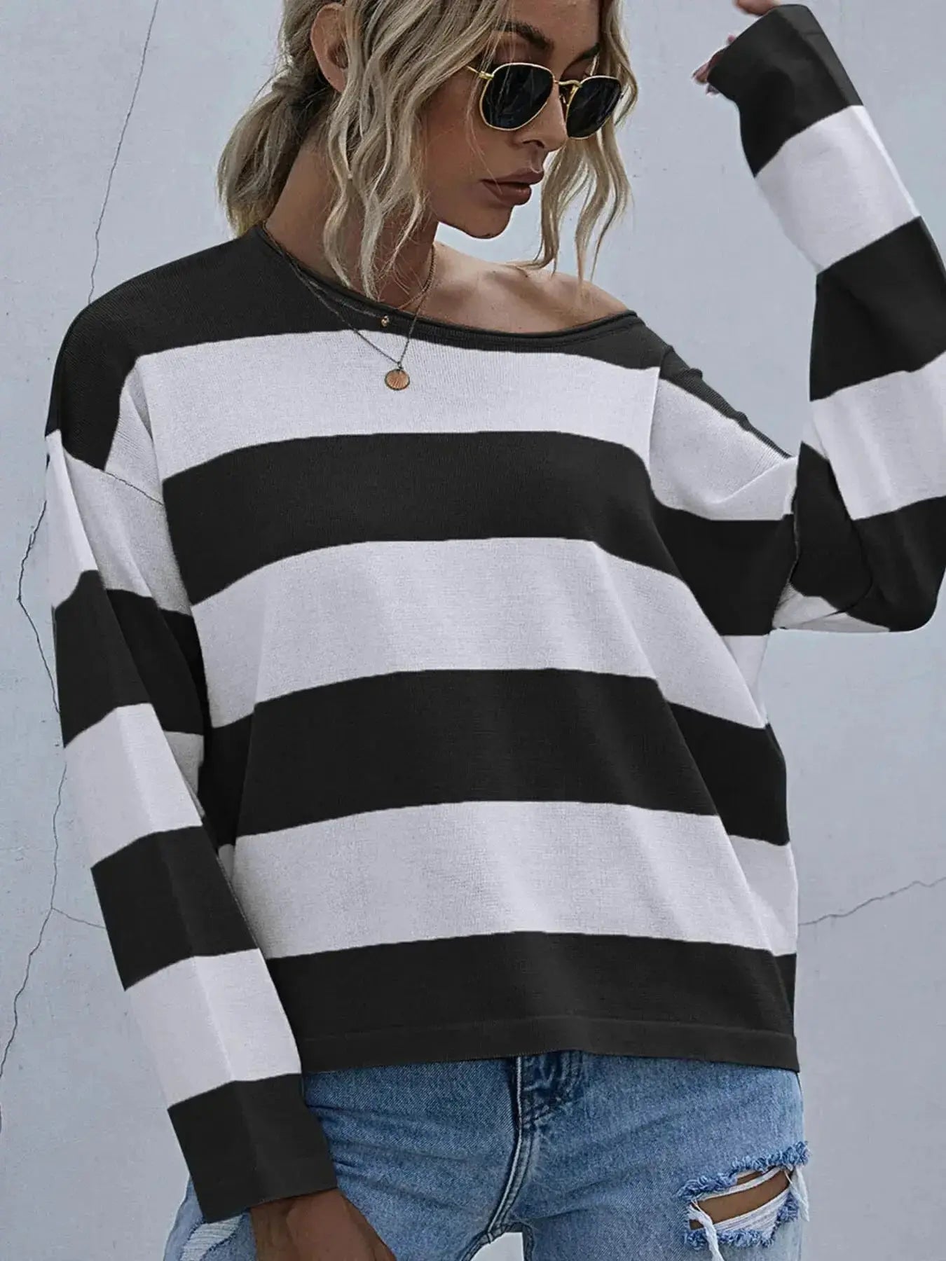 Women's striped long sleeve knit casual crewneck top by Trendsi, featuring a comfortable fit and classic design.