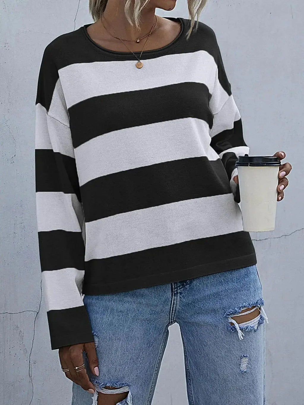 Women's striped long sleeve knit casual crewneck top by Trendsi featuring a comfortable, stylish knit shirt with horizontal stripes.