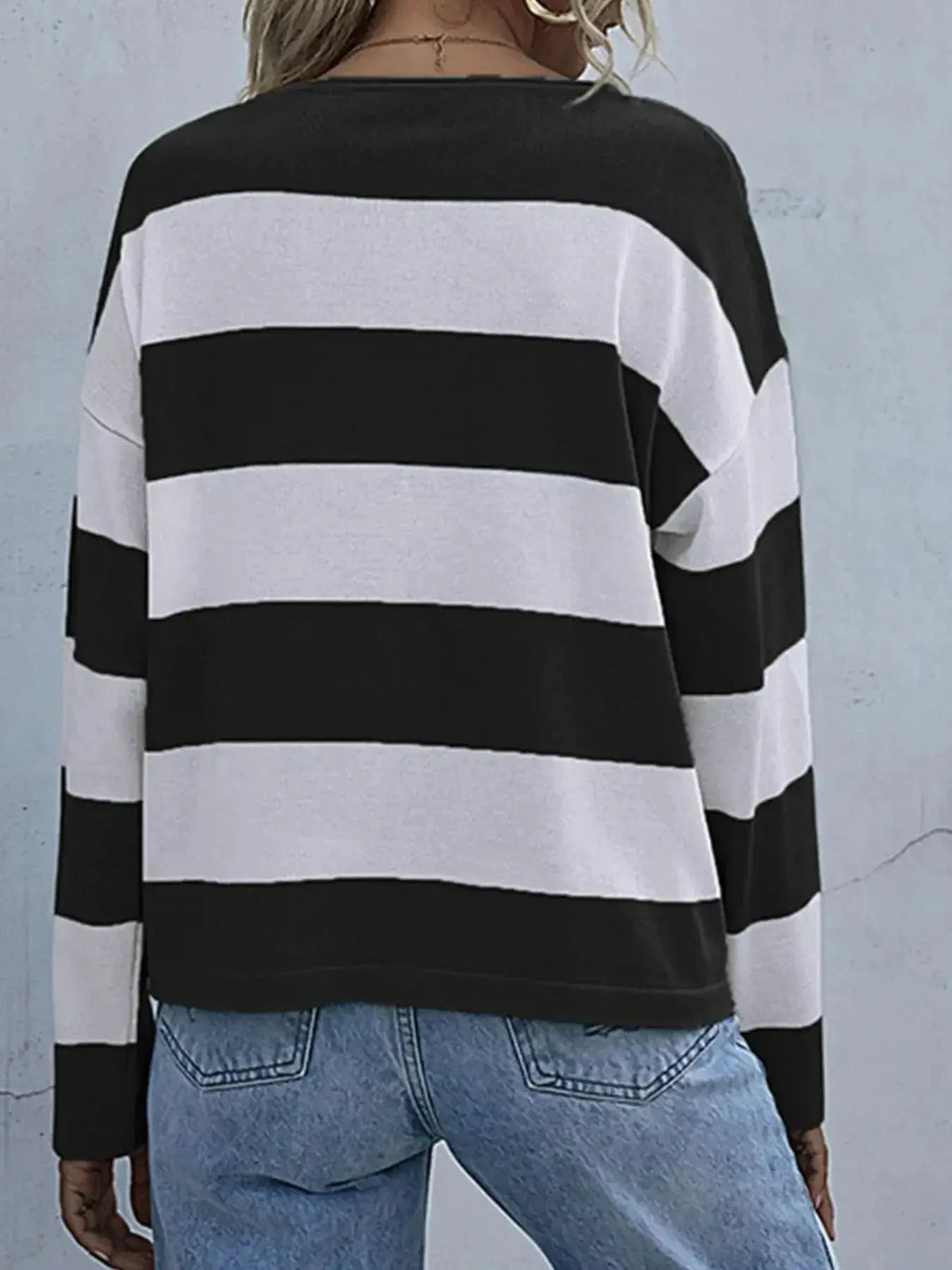 Women's striped long sleeve knit casual crewneck top by Trendsi, featuring a comfortable fit and classic design.