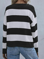 Women's striped long sleeve knit casual crewneck top by Trendsi, featuring a comfortable fit and classic design.