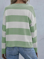 Women’s striped long sleeve knit crewneck top by Trendsi, casual and comfortable shirt with a stylish striped pattern.