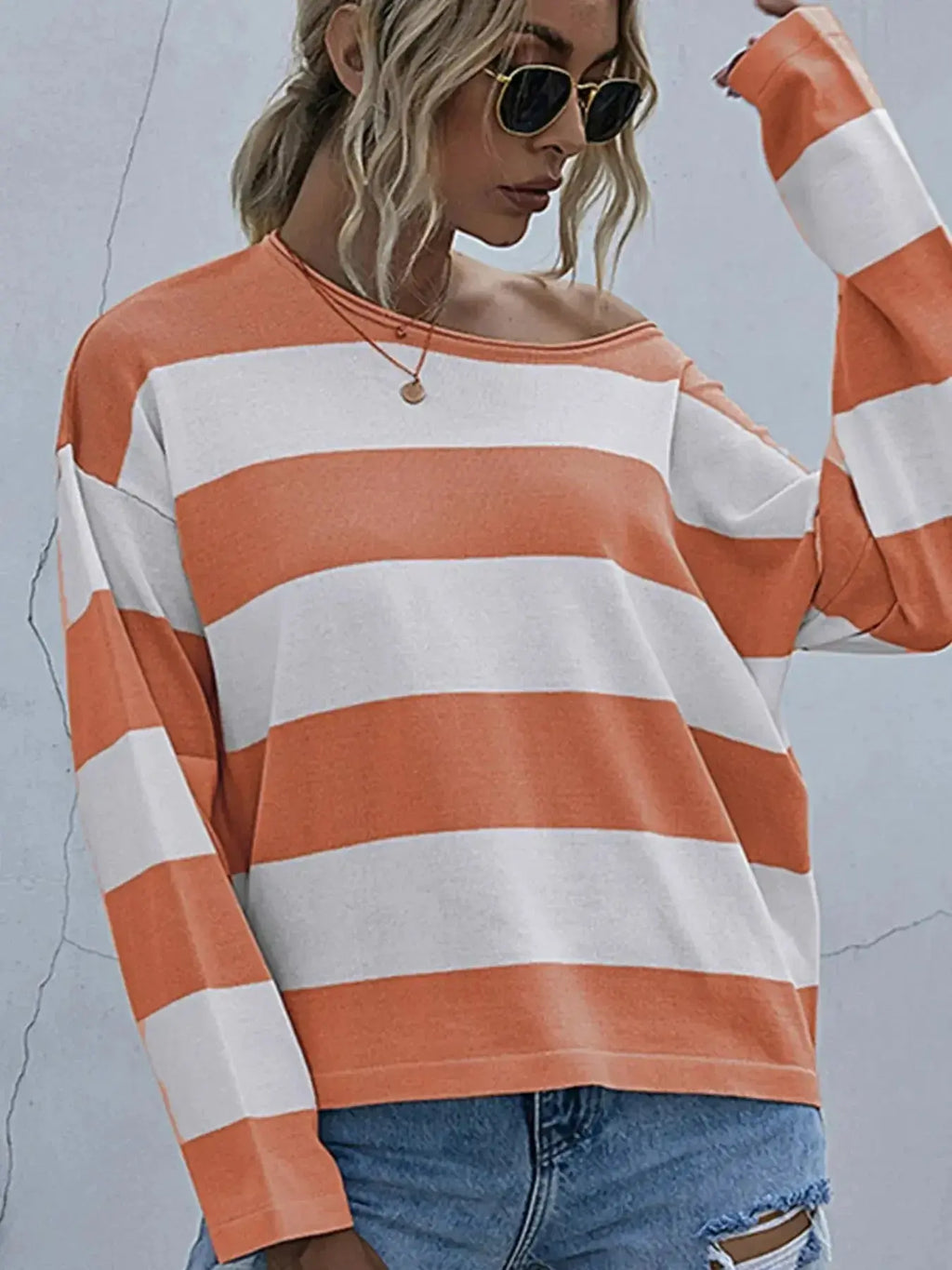 Women’s striped long sleeve knit casual crewneck top by Trendsi, featuring a comfortable fit and classic design.
