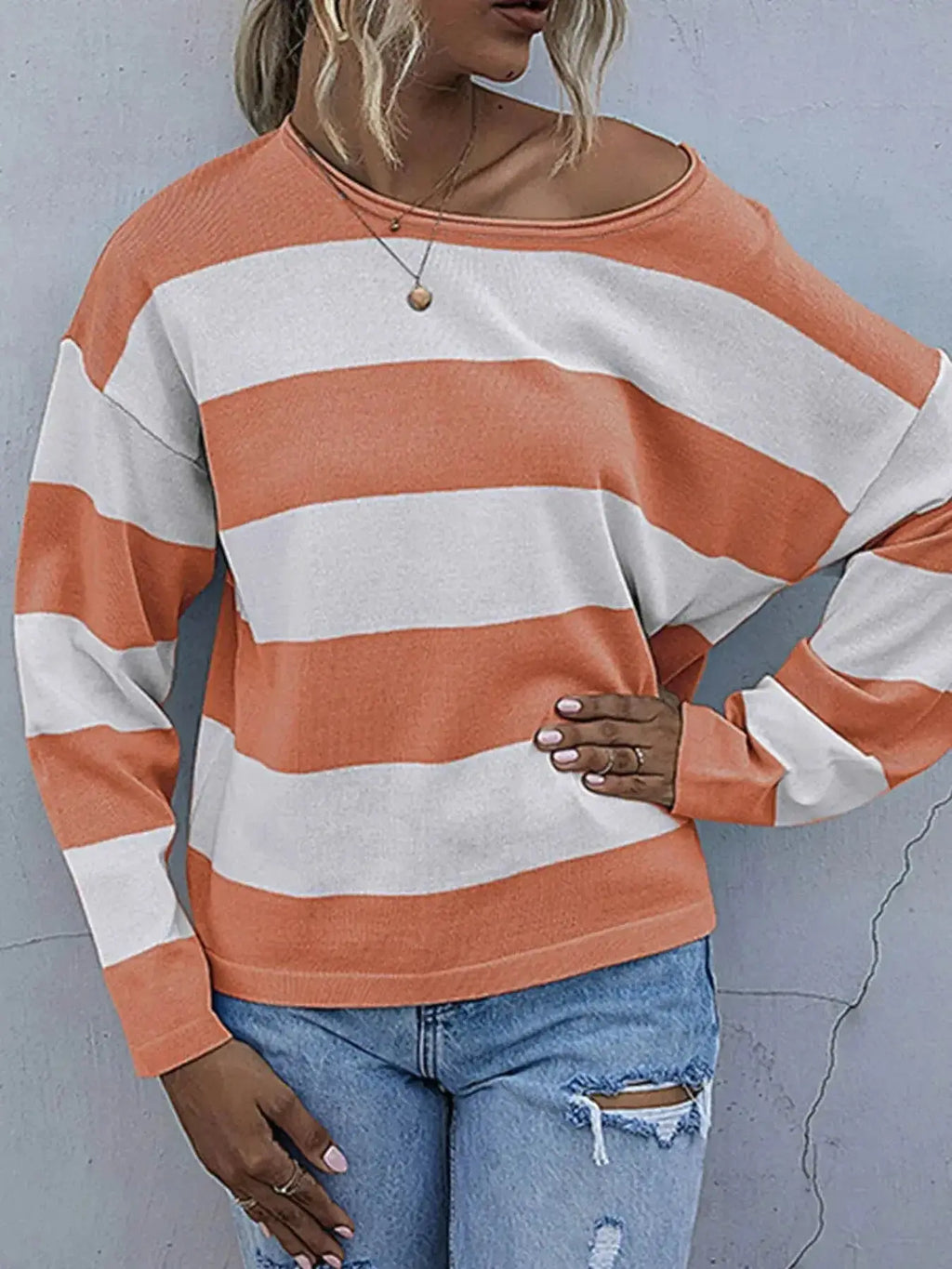 Women's striped long sleeve knit casual crewneck top by Trendsi, featuring a comfortable fit and stylish design.