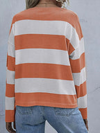Women’s striped long sleeve knit casual crewneck top by Trendsi, featuring a comfortable fit and classic striped pattern.