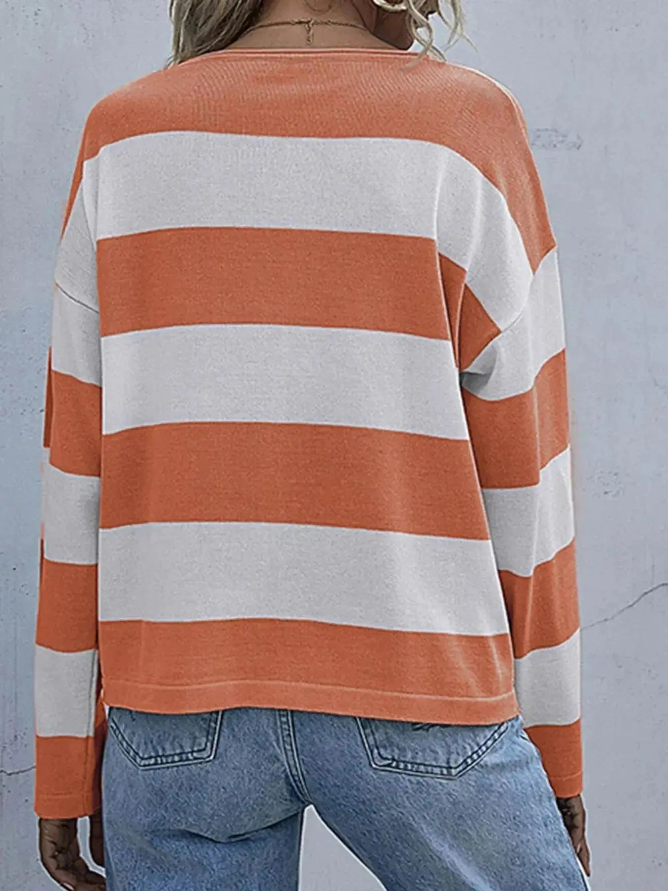 Women’s striped long sleeve knit casual crewneck top by Trendsi, featuring a comfortable fit and classic striped pattern.